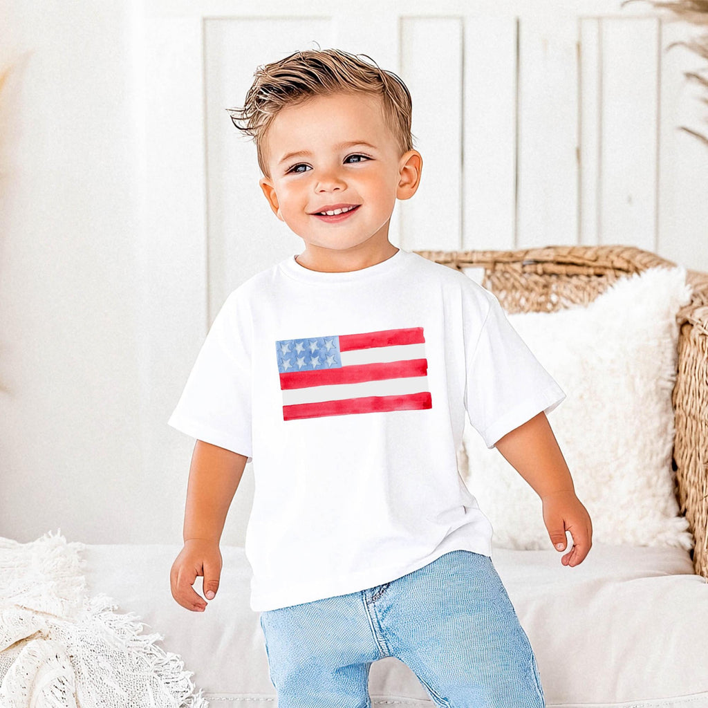Girls 4th July Shirt – Watercolor American Flag Tee with Blue Bow by The Saltwater Press